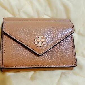 Tory Burch tri-fold wallet. New without tag.